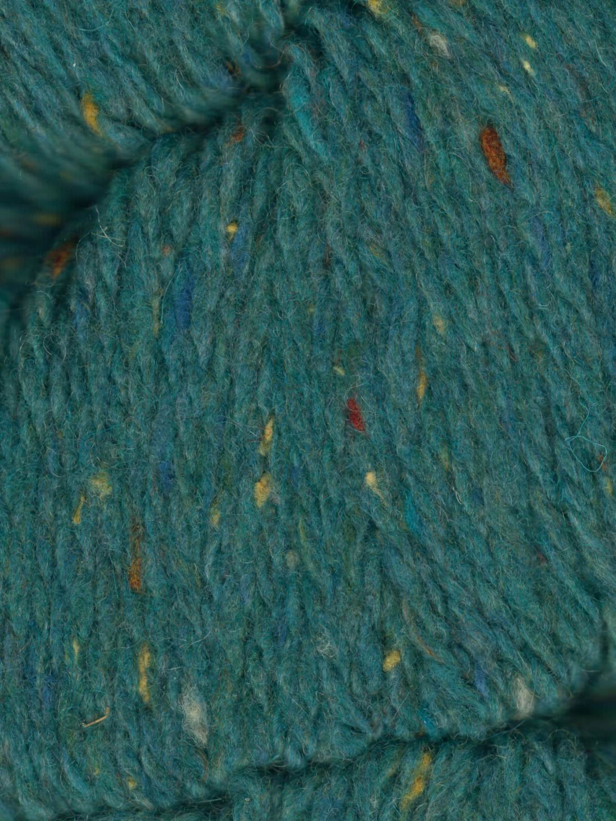 Organic Yarn | Ella Rae Eco Tweed is a blend of Merino wool with polyamide and creates a soft yet strong fiber. This 100% organic yarn is great for knit patterns or crochet patterns: sweaters, scarves, cowls, wraps, and more.