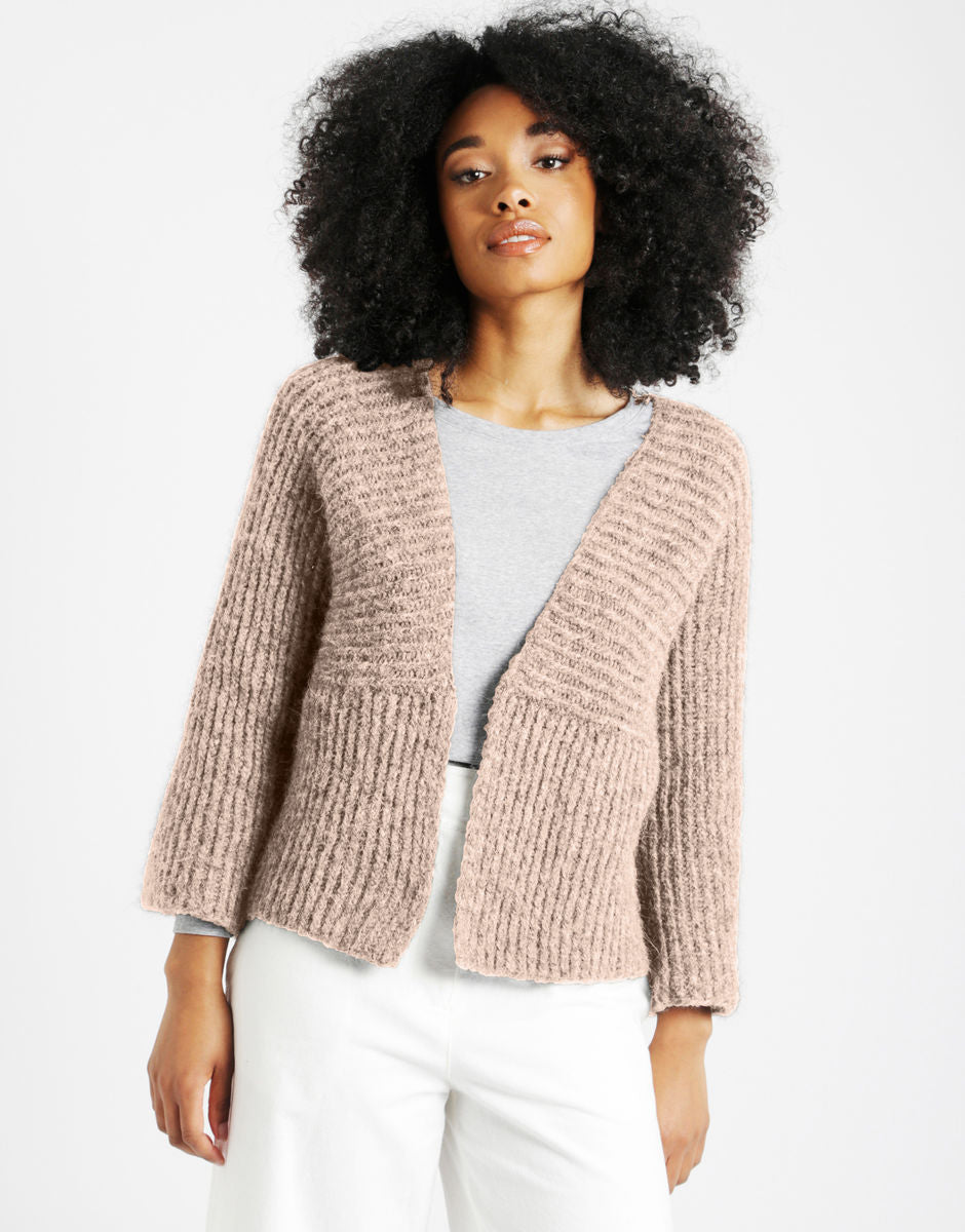 Knitted sweater pattern by Wool and The Gang. Because of the multi-directional stitching, our intermediate knit pattern is more for the experienced knitter.  Alpaca yarn and merino yarn blend makes this a lovely soft yarn to work with.