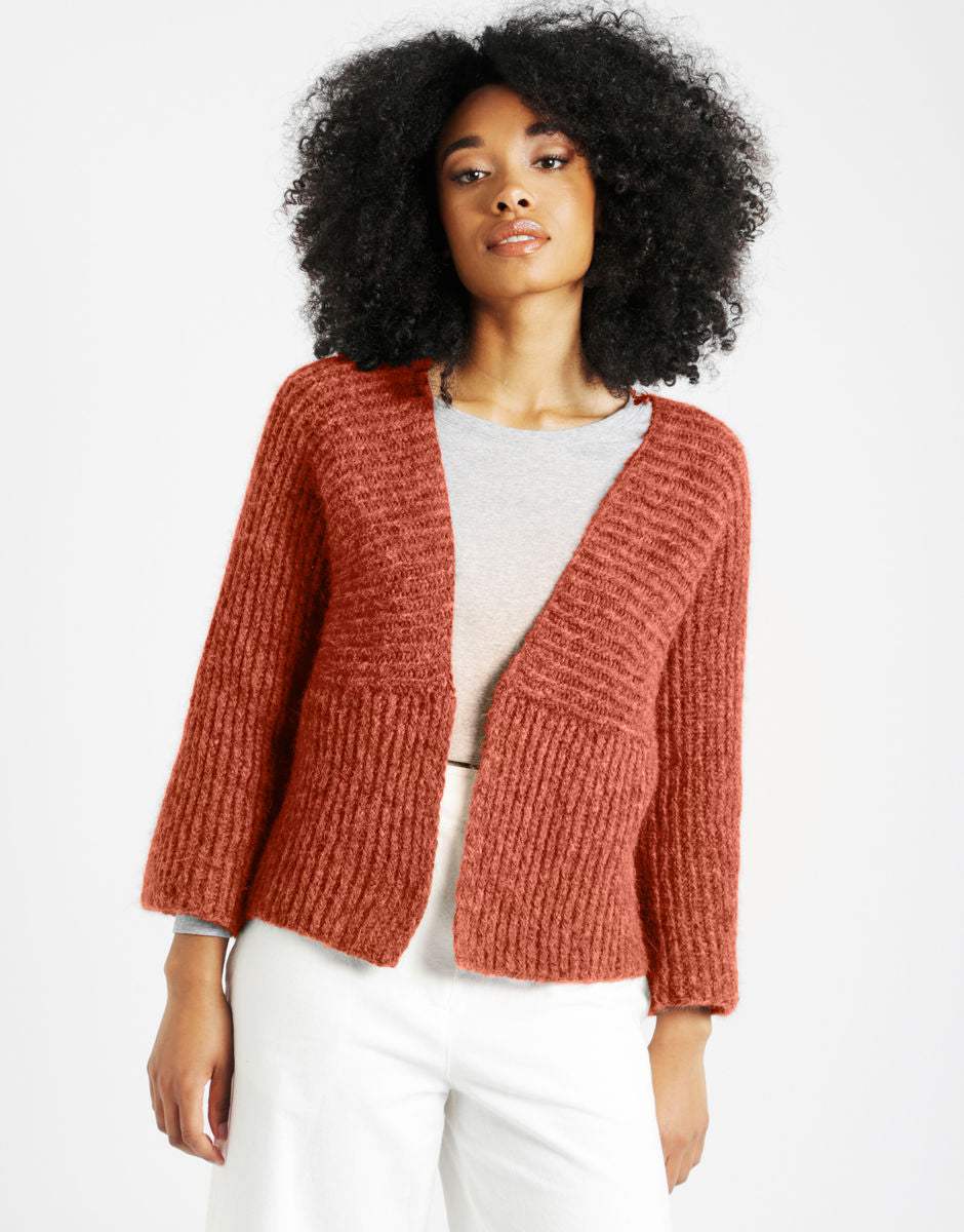 Knitted sweater pattern by Wool and The Gang. Because of the multi-directional stitching, our intermediate knit pattern is more for the experienced knitter.  Alpaca yarn and merino yarn blend makes this a lovely soft yarn to work with.