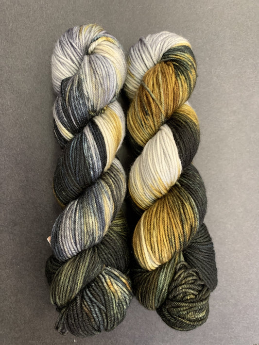 This Merino wool yarn is multi colored yarn by Forbidden Fiber Co.  This is a superwash yarn with beautiful variegated colors.  Steampunk inspired yarn.